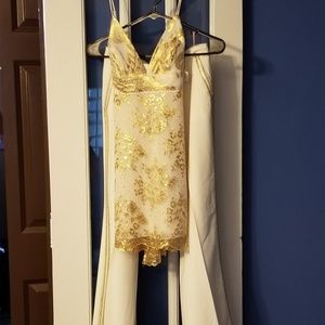 White dress pants with sequin detail.
